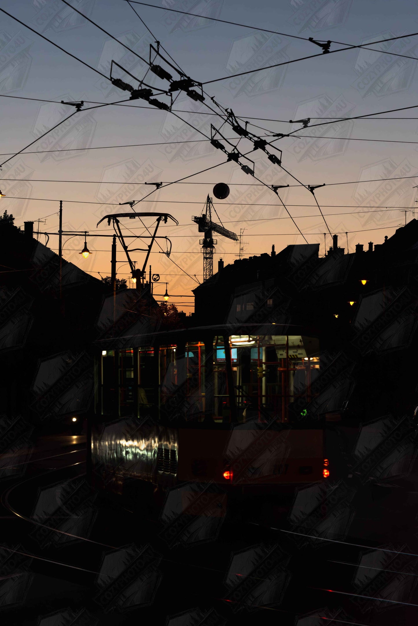 Digital Picture art featuring a tram the Nightline driving between houses under power lines during a golden sunset