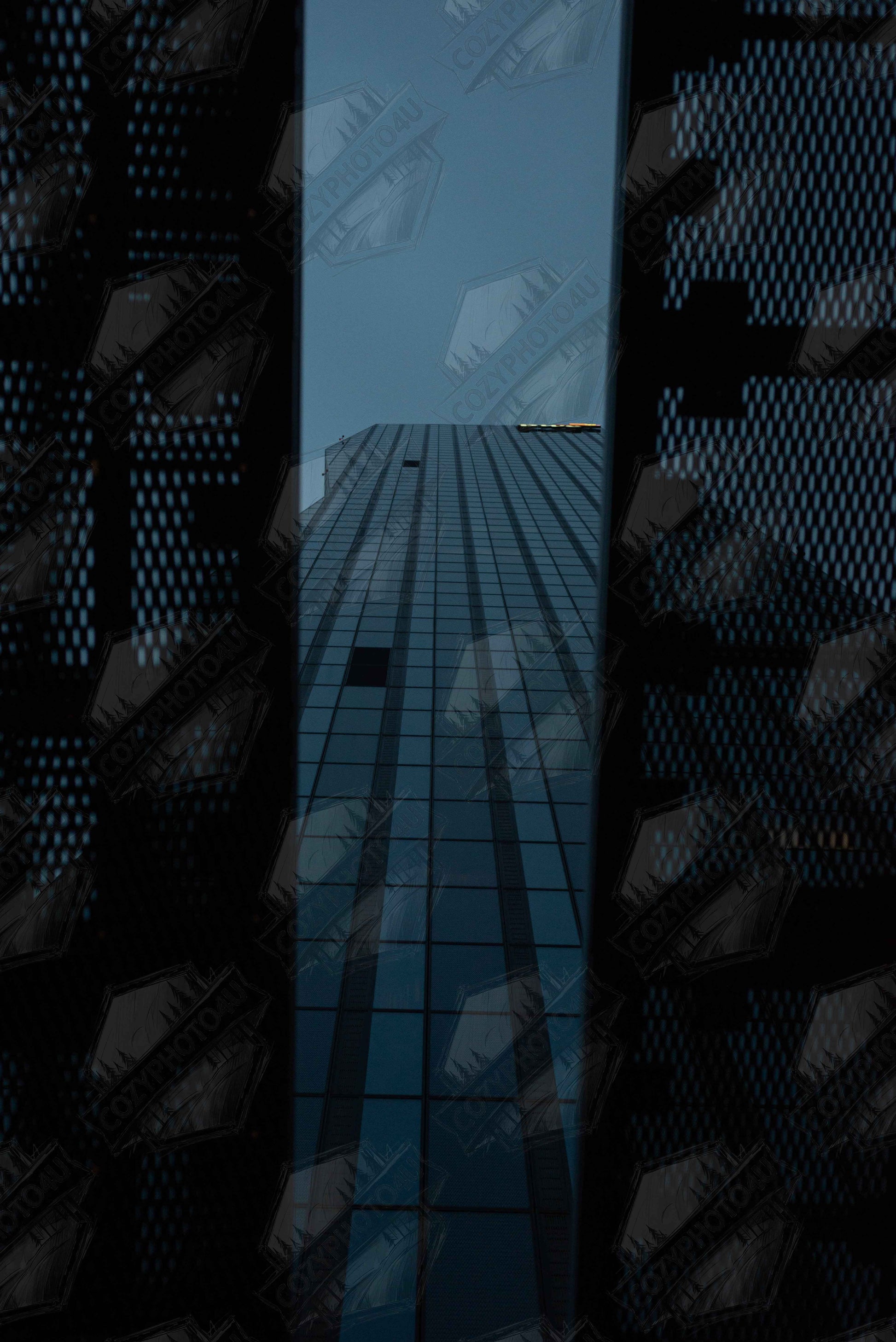 Digital picture art Low angle view looking up at a tall glass skyscraper framed between two metal structural elements