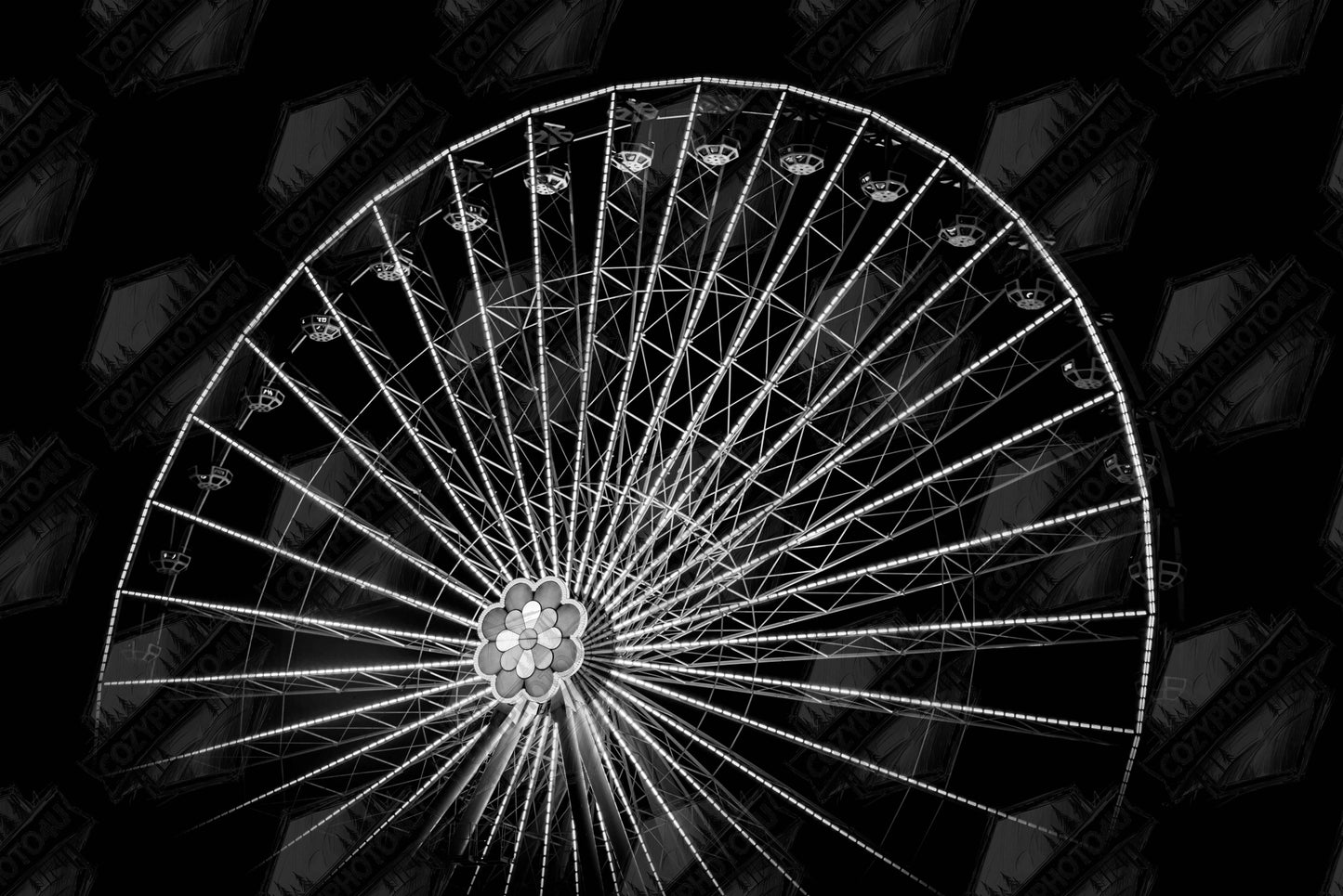 Digital Picture art Black and white night photo of the Vienna Prater Giant Ferris Wheel (Wiener Riesenrad) with illuminated spokes forming a circular pattern against the dark sky