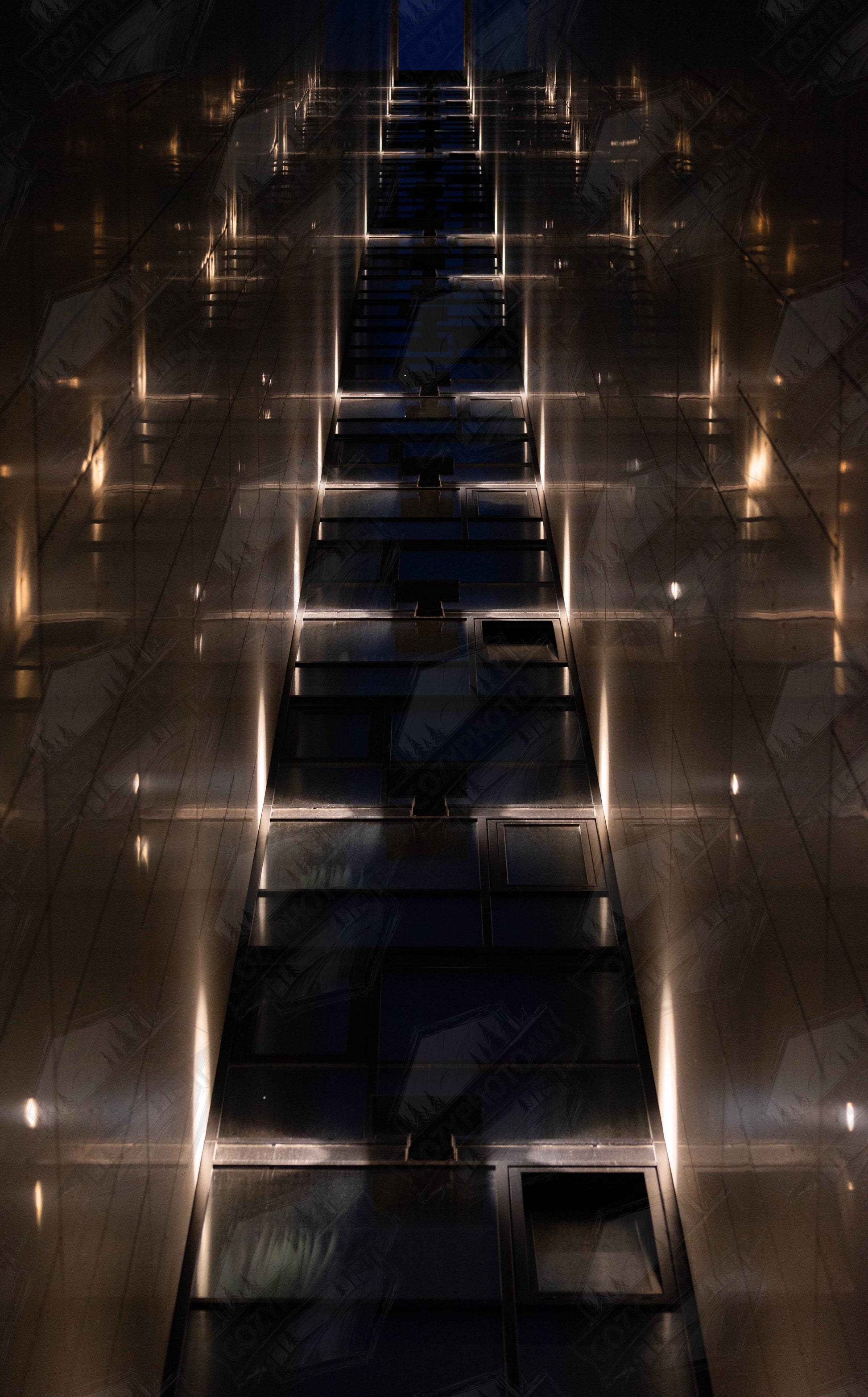 Digital Picture art Low angle view looking up a narrow corridor like passage between two skyscraper walls lined with rows of windows stretching toward the sky