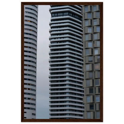Modern high rise tower buildings with glass and steel facade reaching into the sky on wodden framed wall art