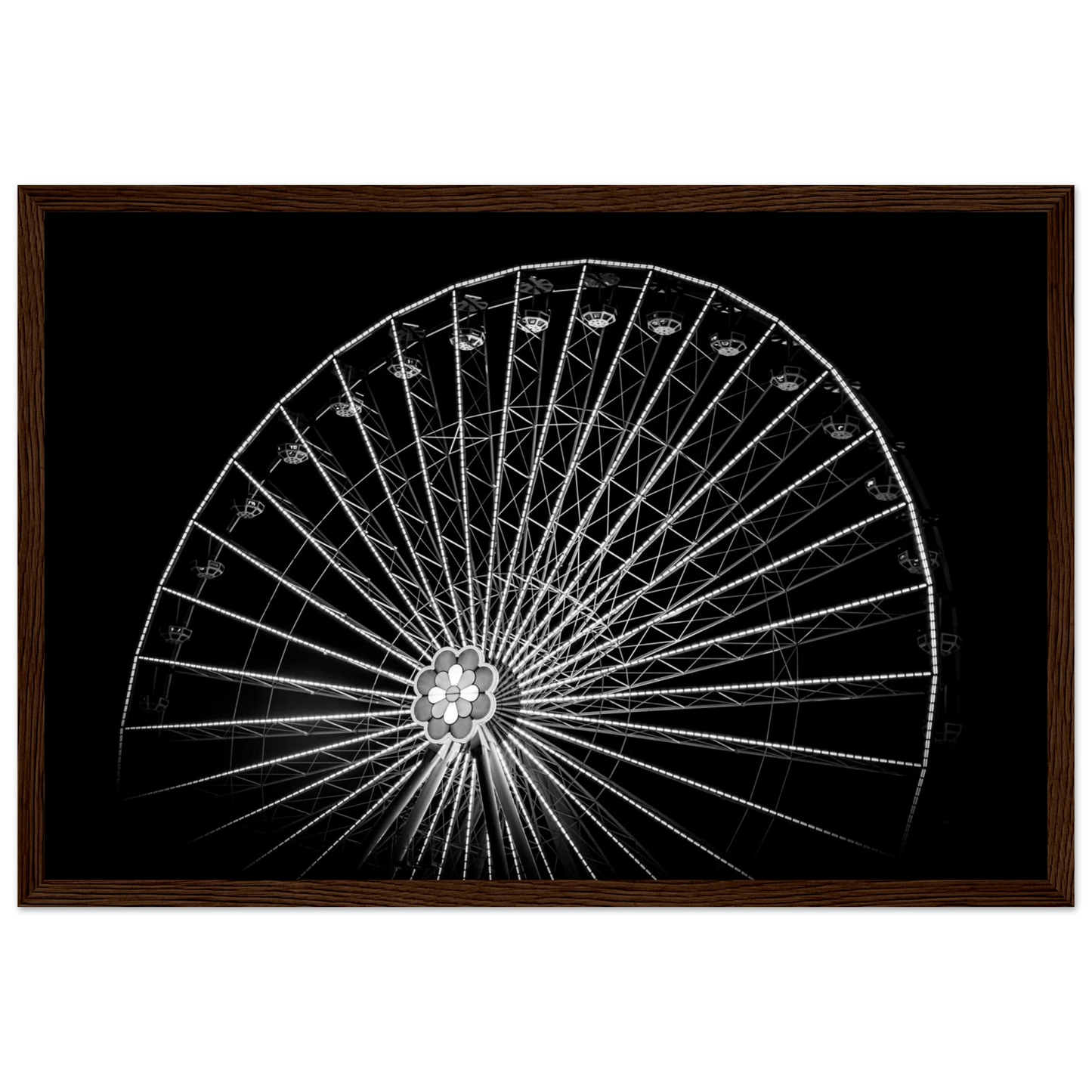 Black and white night photo of the Vienna Prater Giant Ferris Wheel (Wiener Riesenrad) with illuminated spokes forming a circular pattern against the dark sky on wooden framed wall art