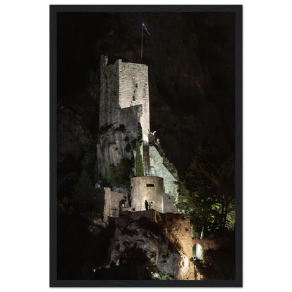 Wooden framed wall art of an ancient stone bastion decorated with green climbing plants against a dark background in Shadow Keep