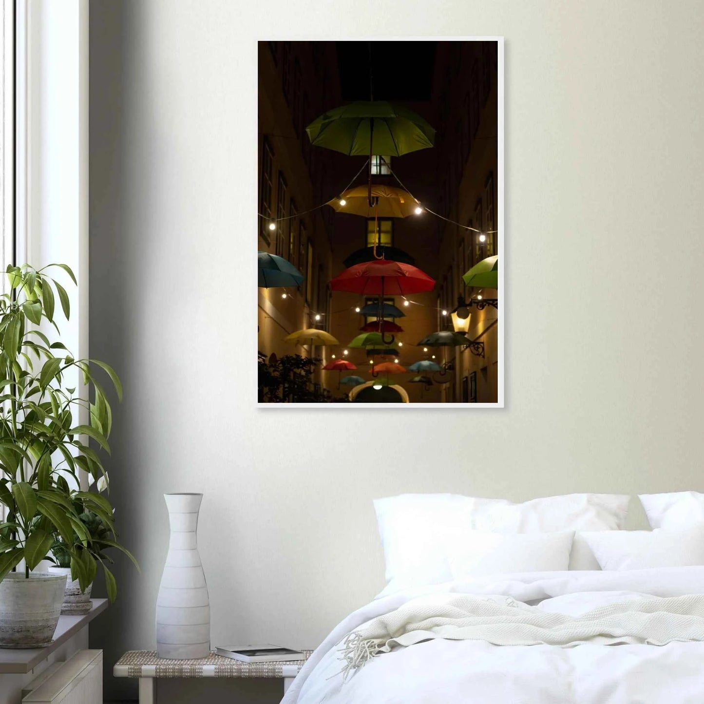 Nighttime street scene with colorful illuminated umbrellas hanging as decoration above a vibrant outdoor area on a wooden frame wall art on the wall in the Bedroom