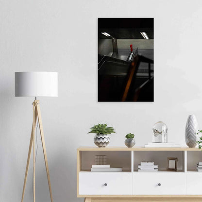 Nighttime view of a metro station entrance with illuminated signs and dark urban surroundings on Canvas print wall art on the wall in the Livingroom