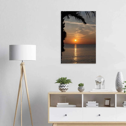 Canvas print wall art, Sunset over calm water with golden reflections, framed by tree branches in a peaceful natural landscape on the wall in the Bedroom