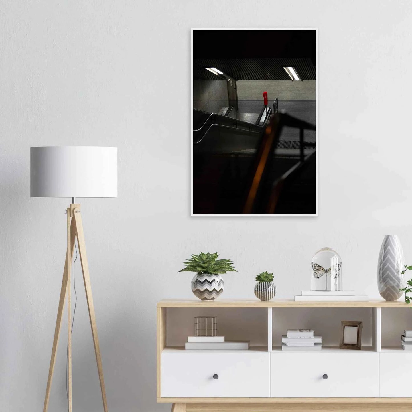 Nighttime view of a metro station entrance with illuminated signs and dark urban surroundings on wooden framed wall art on the wall in the Livingroom