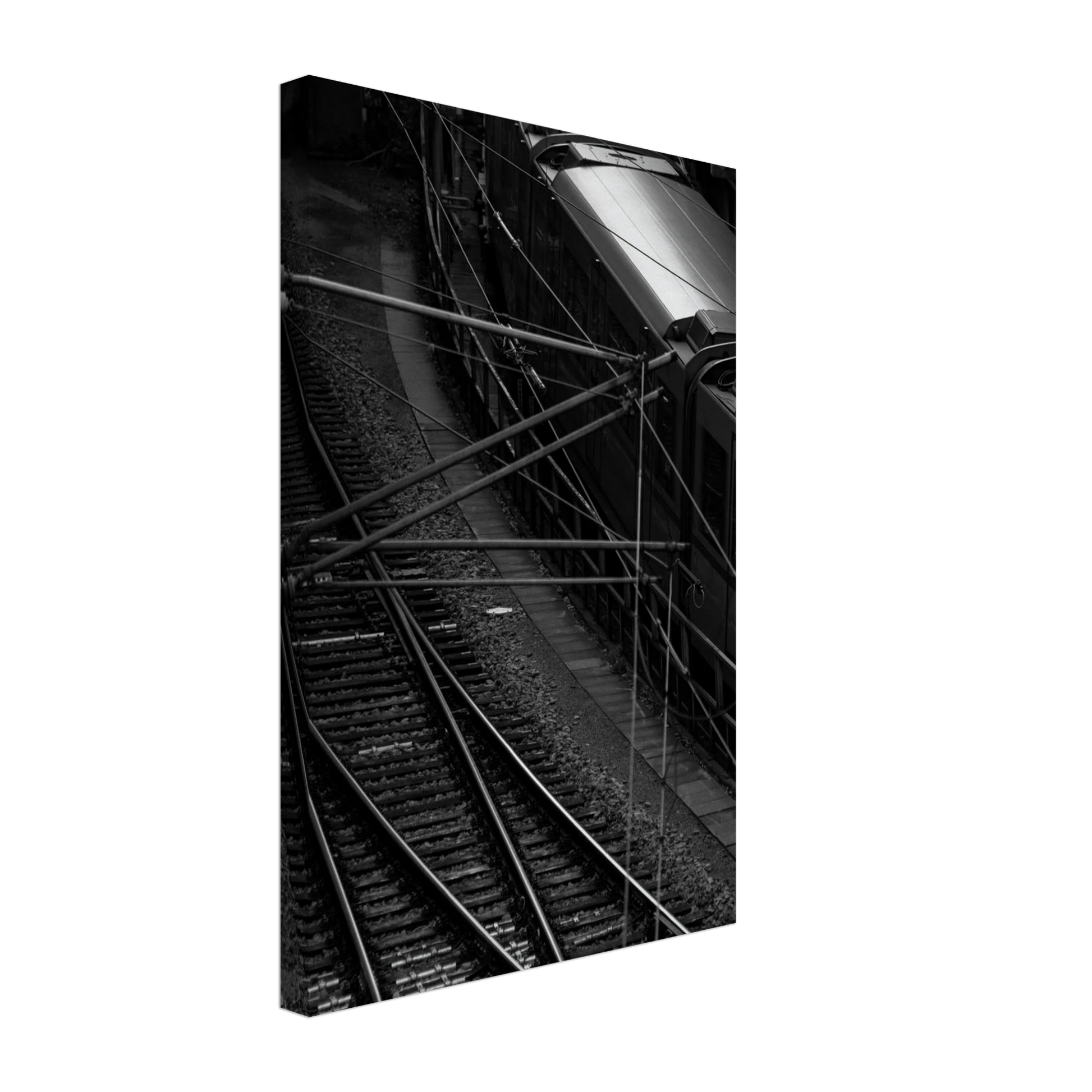 Black and white aerial view of metro train and railway tracks in an urban underground or elevated rail system on Canvas Print wall art on the wall in the Livingroom