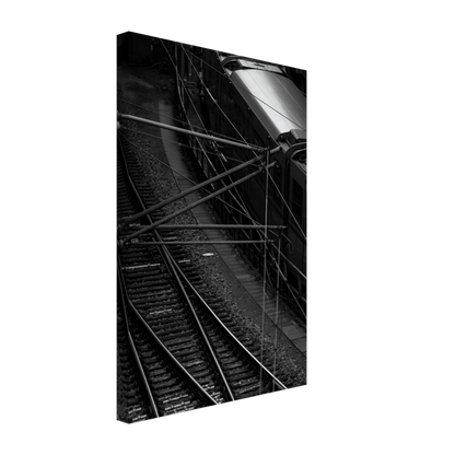 Black and white aerial view of metro train and railway tracks in an urban underground or elevated rail system on Canvas Print wall art on the wall in the Livingroom