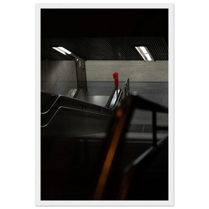 Nighttime view of a metro station entrance with illuminated signs and dark urban surroundings on wooden framed wall art