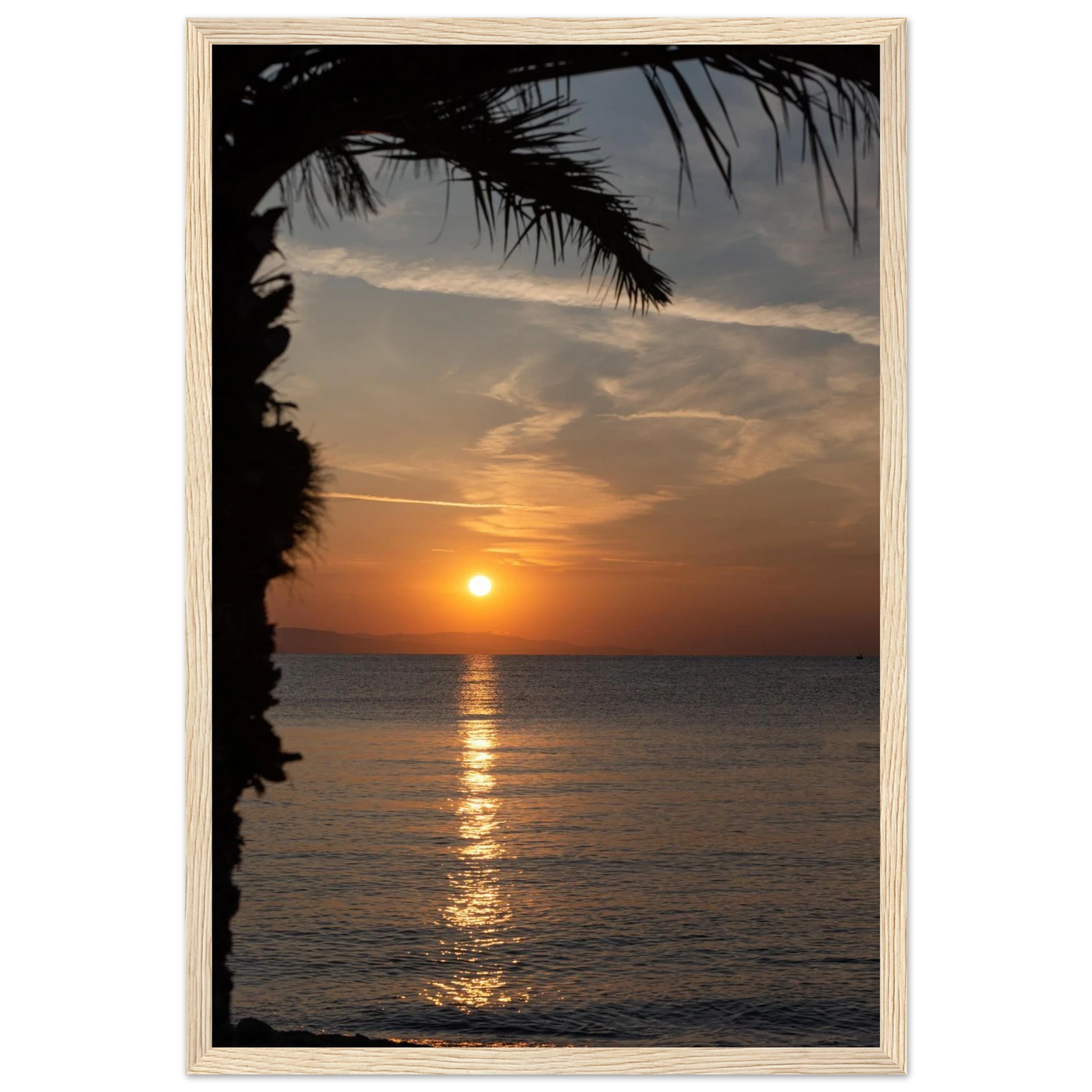 Wooden framed wall art Sunset over calm water with golden reflections, framed by tree branches in a peaceful natural landscape