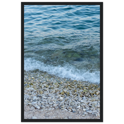 Aerial view ocean beach with wood frame, top down drone shot of blue sea foam and pebbles
