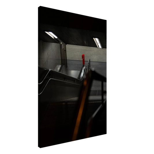 Nighttime view of a metro station entrance with illuminated signs and dark urban surroundings on Canvas print wall art