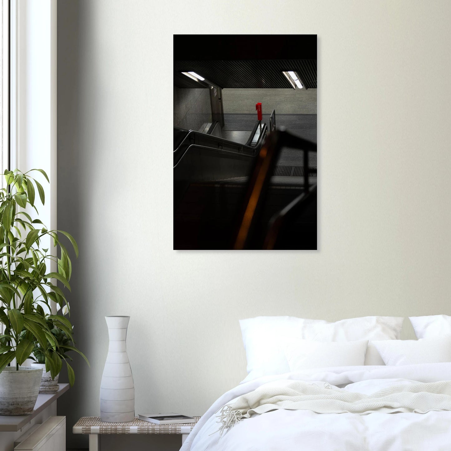 Nighttime view of a metro station entrance with illuminated signs and dark urban surroundings on Canvas print wall art on the wall in the Bedroom