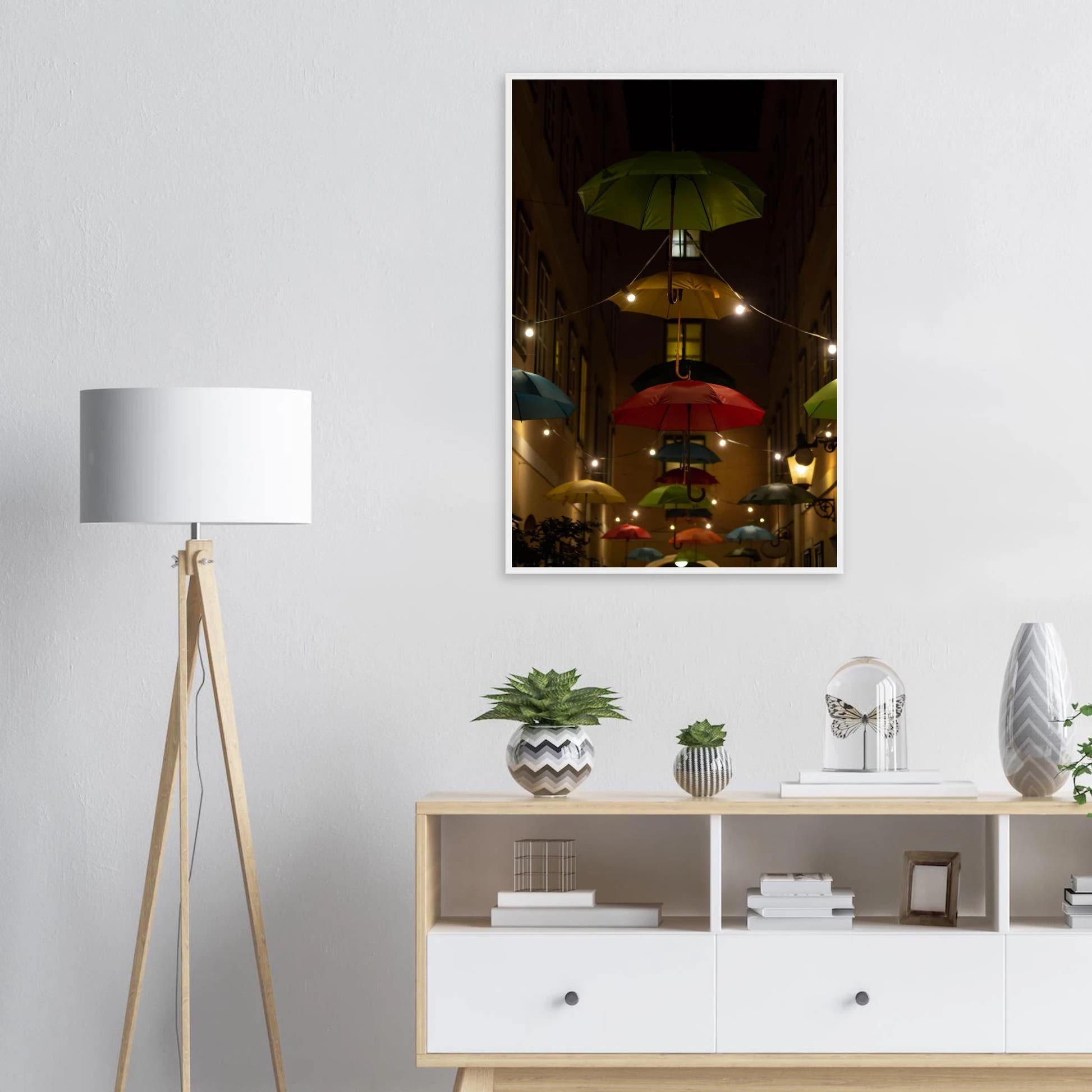 Nighttime street scene with colorful illuminated umbrellas hanging as decoration above a vibrant outdoor area on a wooden frame wall art on the wall in the Livingroom