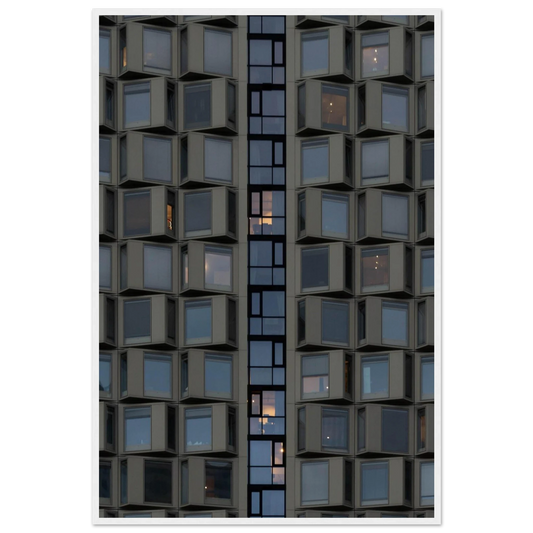 Close up view of a modern building facade with a grid of reflective glass windows on wooden frame wall art