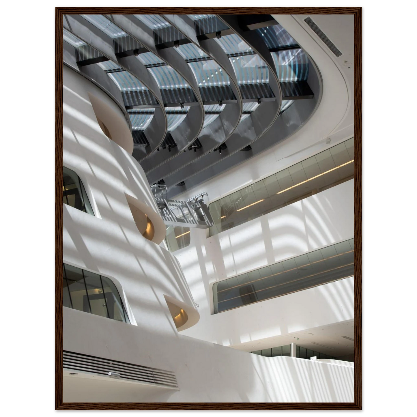 Interior view of the Library of WU (Vienna University of Economics and Business) on wooden frame wall art featuring modern architecture with multiple floors and open study spaces