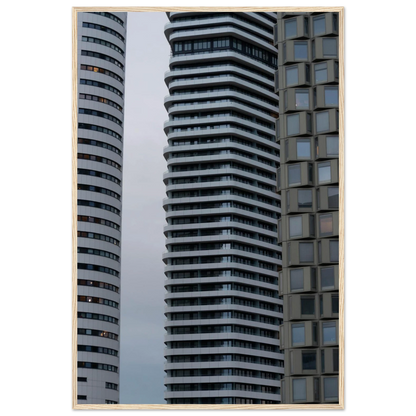 Modern high rise tower buildings with glass and steel facade reaching into the sky on wodden framed wall art