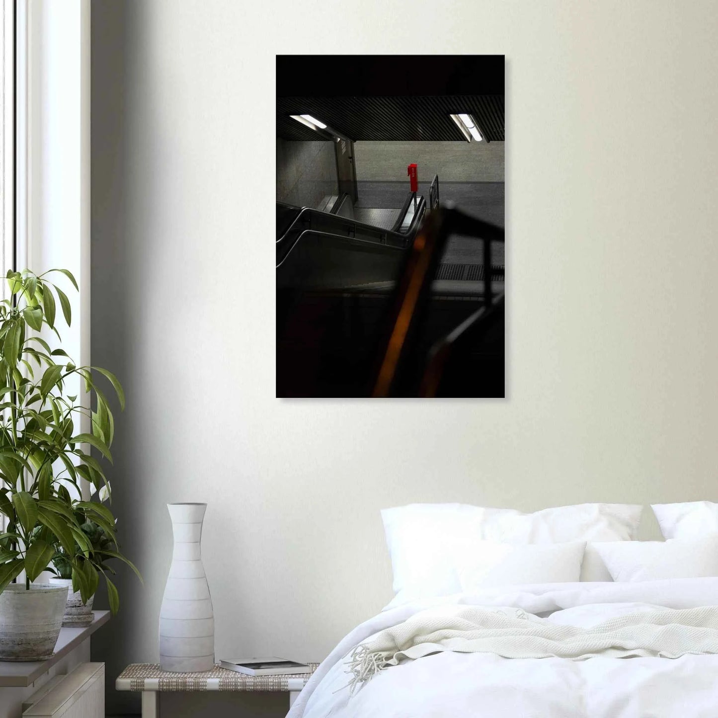 Nighttime view of a metro station entrance with illuminated signs and dark urban surroundings on Canvas print wall art on the wall in the Bedroom