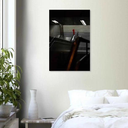 Nighttime view of a metro station entrance with illuminated signs and dark urban surroundings on Canvas print wall art on the wall in the Bedroom
