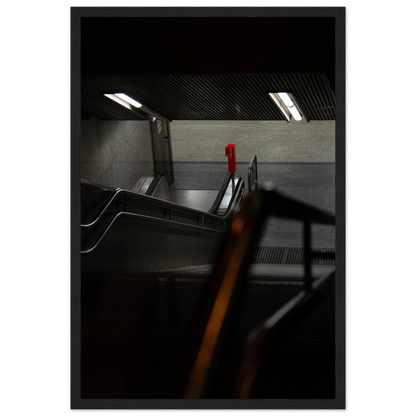Nighttime view of a metro station entrance with illuminated signs and dark urban surroundings on wooden framed wall art