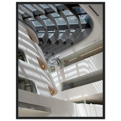 Interior view of the Library of WU (Vienna University of Economics and Business) on wooden frame wall art featuring modern architecture with multiple floors and open study spaces