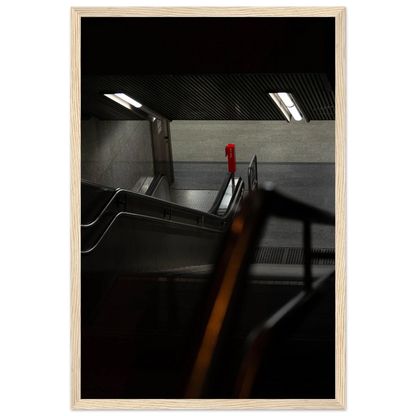 Nighttime view of a metro station entrance with illuminated signs and dark urban surroundings on wooden framed wall art
