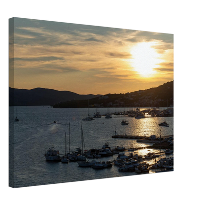 Canvas Print wall art of small boats anchored in a seaside port during Sunset at the harbor