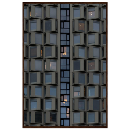 Close up view of a modern building facade with a grid of reflective glass windows on wooden frame wall art