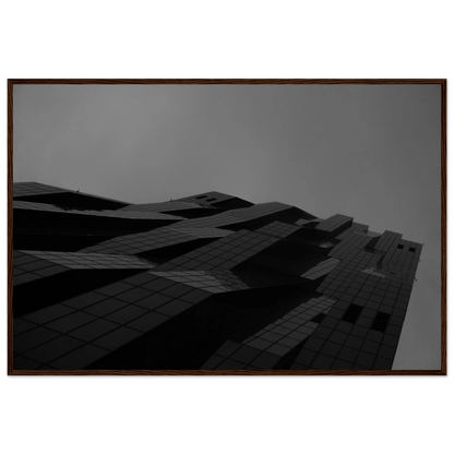 Black and white low angle view of a modern skyscraper with bold geometric lines and dark textured facade on wooden framed wall art