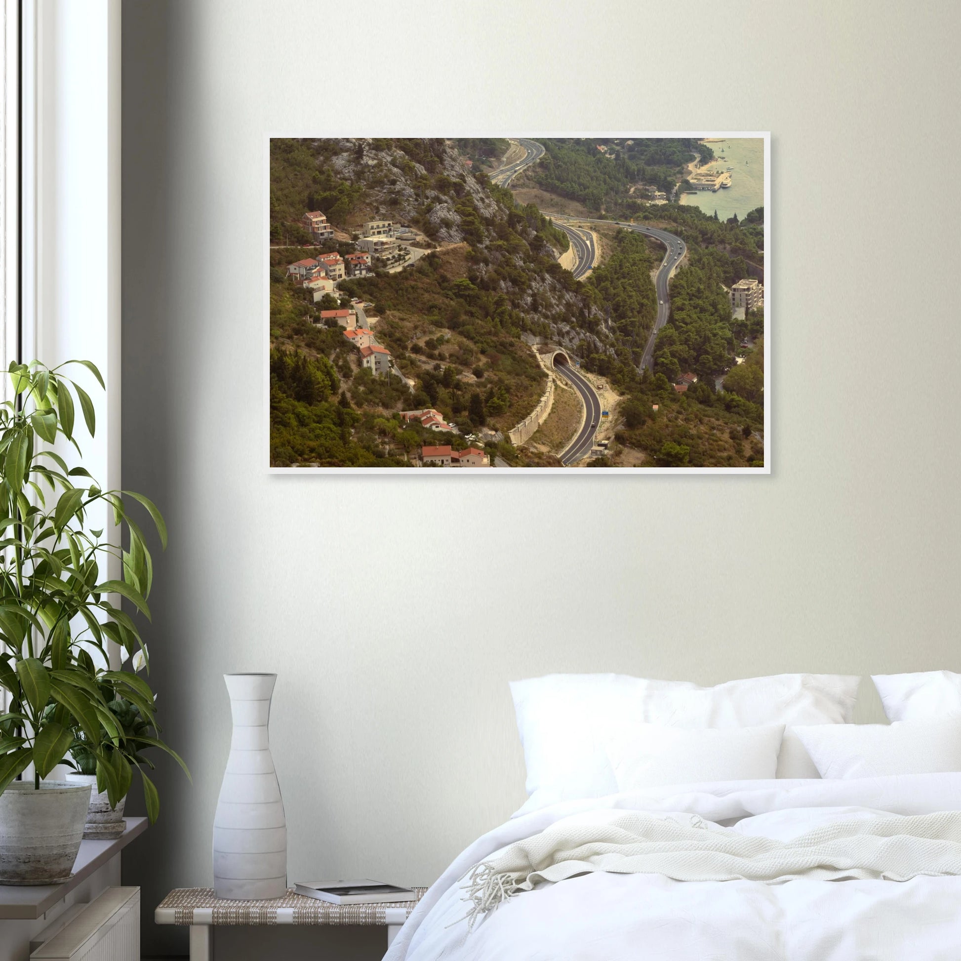 Classic, retro oil painting of a detailed landscape scene with lush trees, figures and rich natural surroundings on wooden framed wall art on the wall in the Bedroom