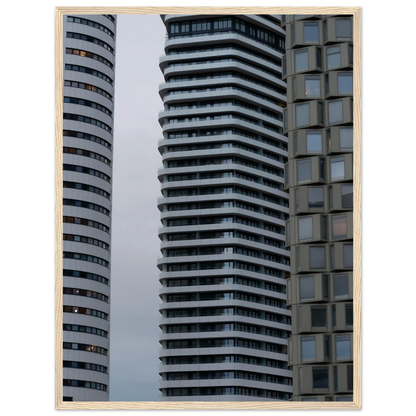 Modern high rise tower buildings with glass and steel facade reaching into the sky on wodden framed wall art