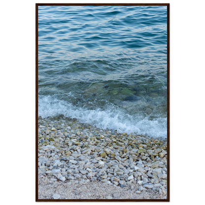 Aerial view ocean beach with wood frame, top down drone shot of blue sea foam and pebbles