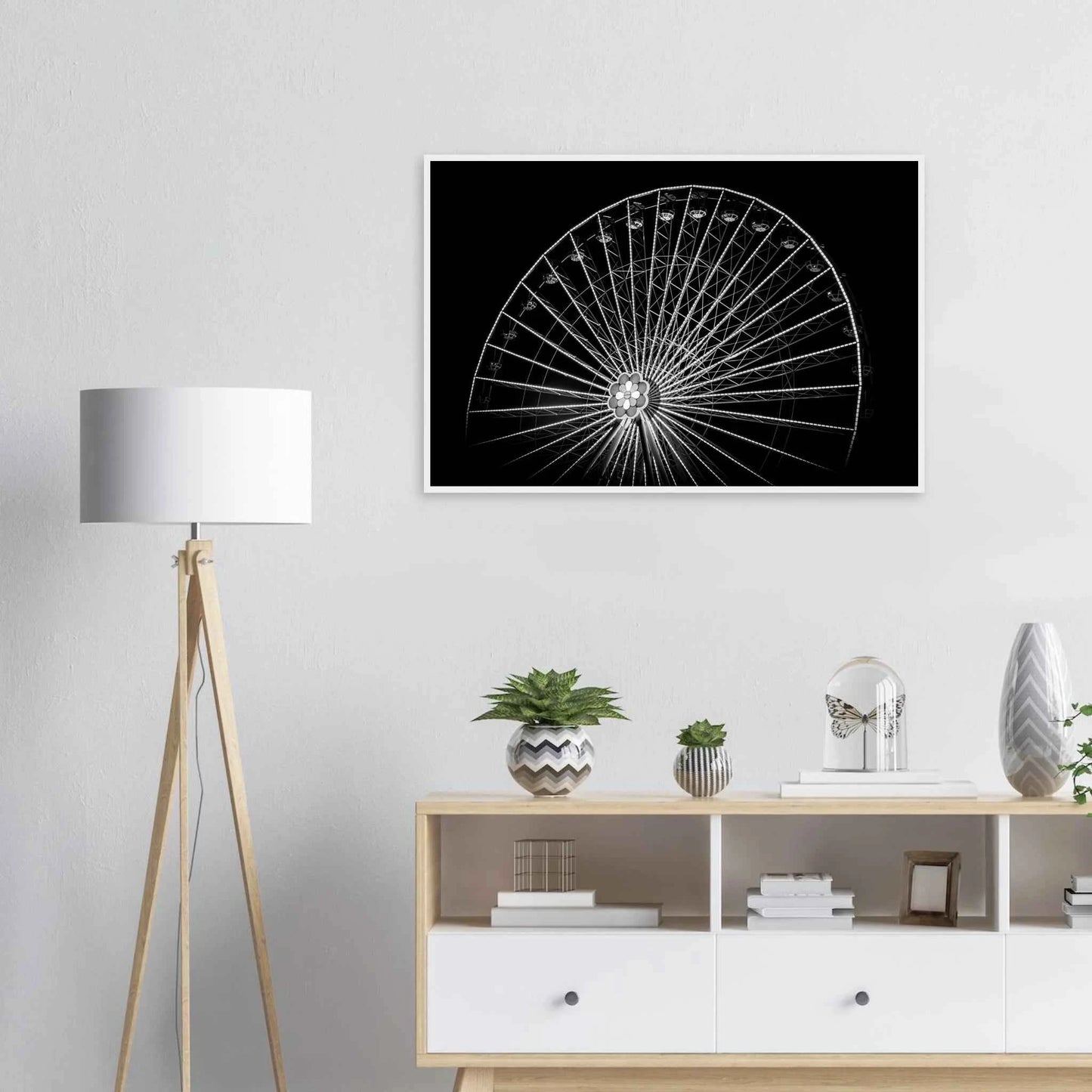 Black and white night photo of the Vienna Prater Giant Ferris Wheel (Wiener Riesenrad) with illuminated spokes forming a circular pattern against the dark sky on wooden framed wall art on the wall in the Livingroom