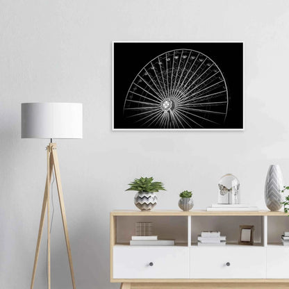 Black and white night photo of the Vienna Prater Giant Ferris Wheel (Wiener Riesenrad) with illuminated spokes forming a circular pattern against the dark sky on wooden framed wall art on the wall in the Livingroom