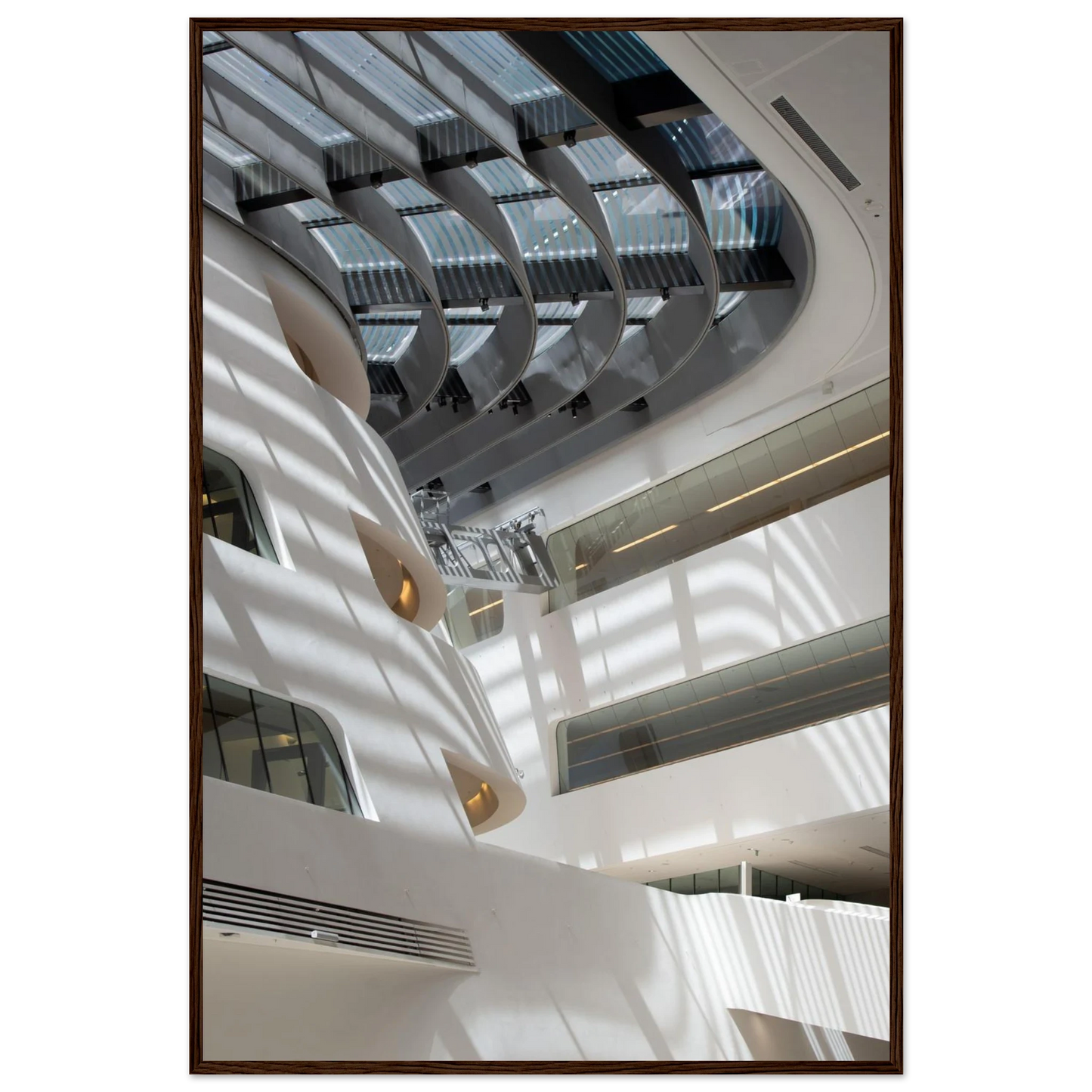 Interior view of the Library of WU (Vienna University of Economics and Business) on wooden frame wall art featuring modern architecture with multiple floors and open study spaces