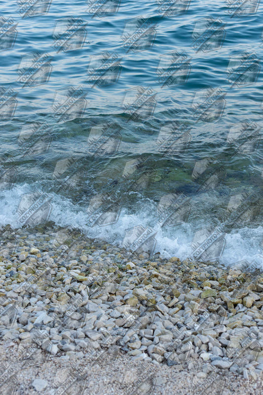 Digital picture Aerial view ocean beach with wood frame canvas print, top down drone shot of blue sea foam and pebbles