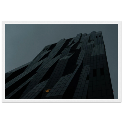 Bluish low angle view of a modern skyscraper with bold geometric lines and dark textured facade on Wooden framed wall art