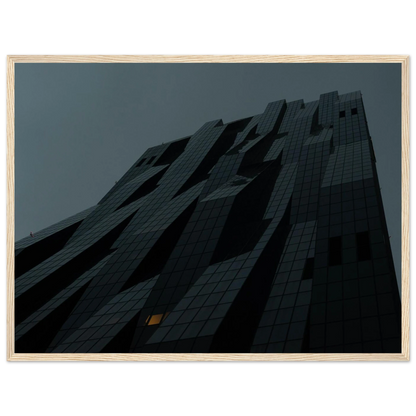 Bluish low angle view of a modern skyscraper with bold geometric lines and dark textured facade on Wooden framed wall art