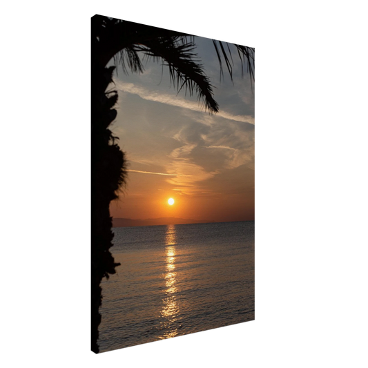 Canvas print wall art, Sunset over calm water with golden reflections, framed by tree branches in a peaceful natural landscape