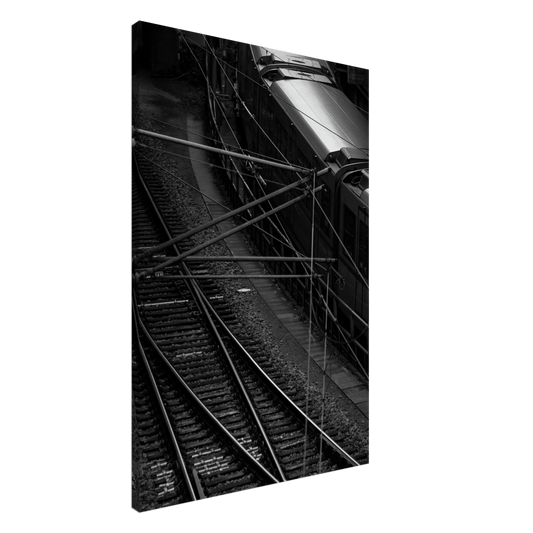 Black and white aerial view of metro train and railway tracks in an urban underground or elevated rail system on Canvas Print wall art