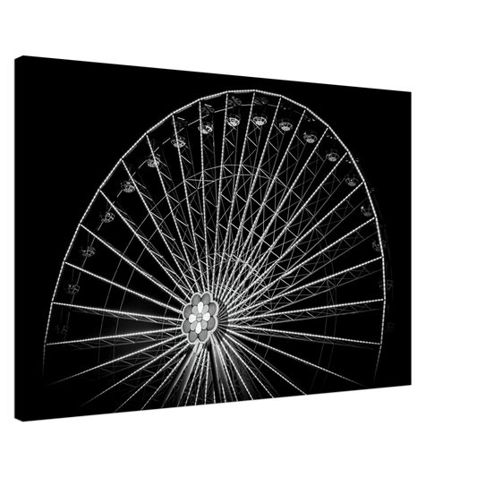 Black and white night photo of the Vienna Prater Giant Ferris Wheel (Wiener Riesenrad) with illuminated spokes forming a circular pattern against the dark sky on Canvas Print wall art
